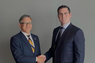 DNP Backs Laxton for Global Authentication Expansion